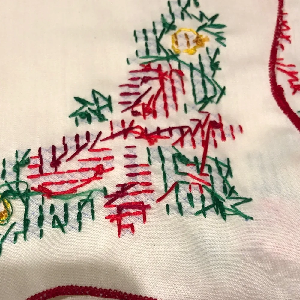 Embroidered Table Linens with Red Trim